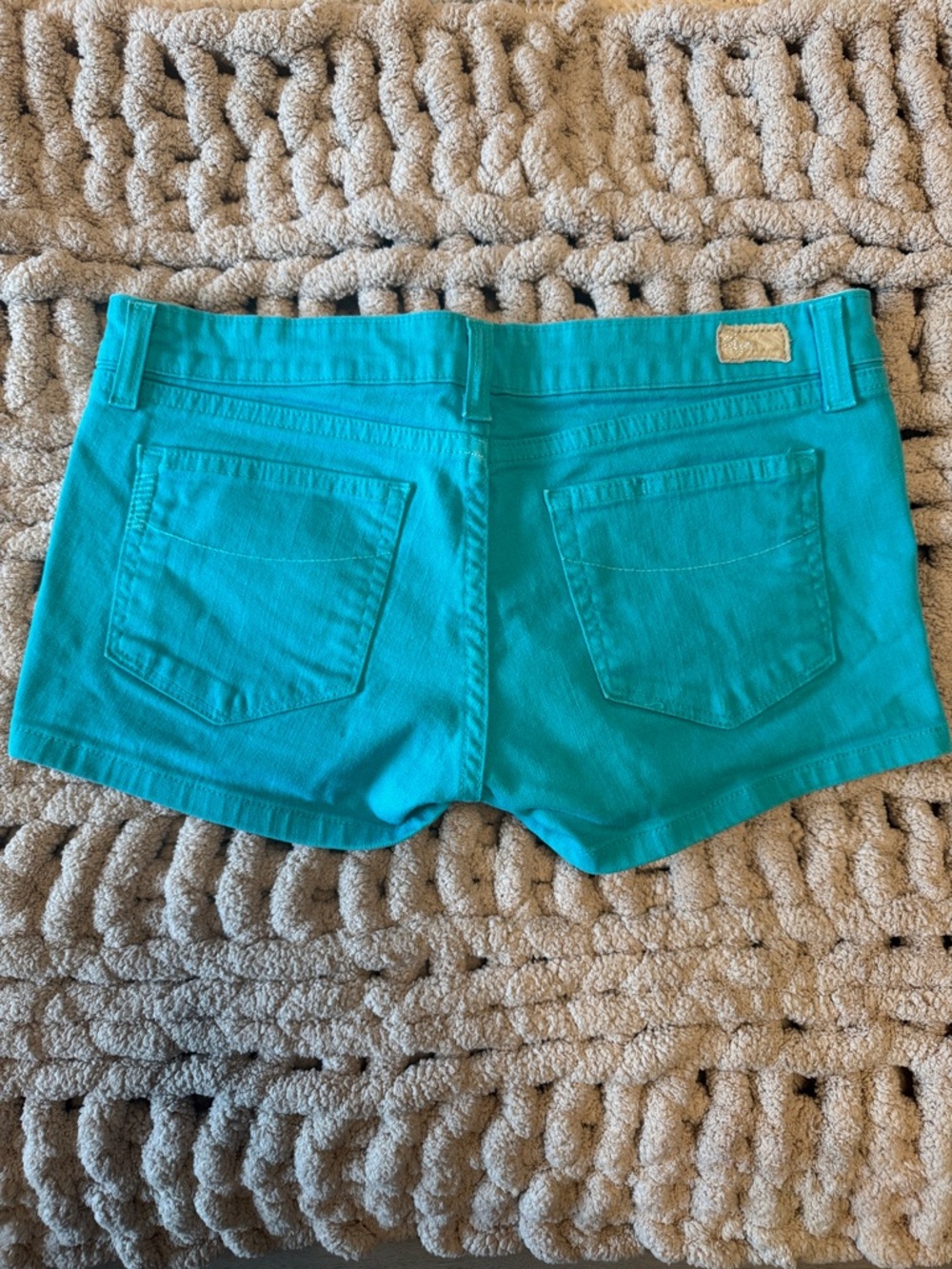 PAIGE Teal Low-Rise Denim Shorts